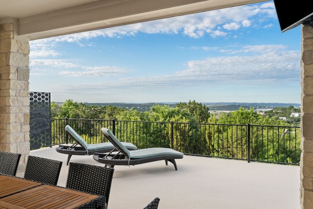 balcony featuring outdoor dining space