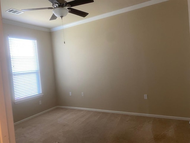 721 Independence Creek Ln, Georgetown, TX 78633 - empty room featuring visible vents, baseboards, ceiling fan, light colored carpet, and ornamental molding