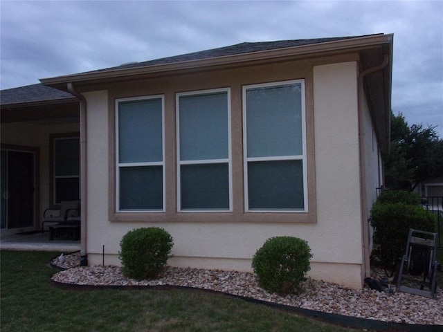 721 Independence Creek Ln, Georgetown, TX 78633 - view of side of home with stucco siding