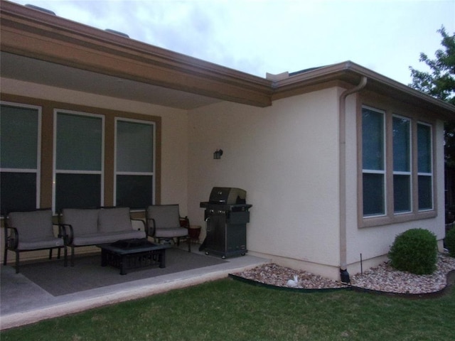 721 Independence Creek Ln, Georgetown, TX 78633 - back of house with an outdoor hangout area, stucco siding, and a patio