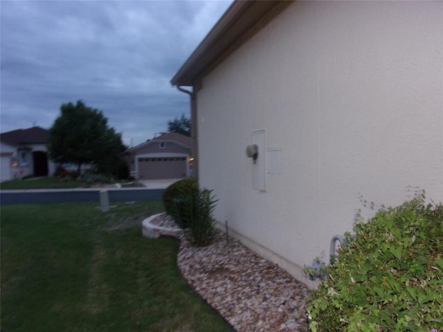 721 Independence Creek Ln, Georgetown, TX 78633 - view of property exterior with stucco siding and a lawn