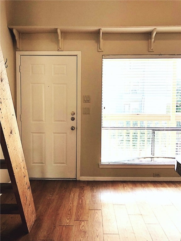 2210 Pearl St Unit 304, Austin, TX 78705 - entrance foyer featuring dark wood-type flooring