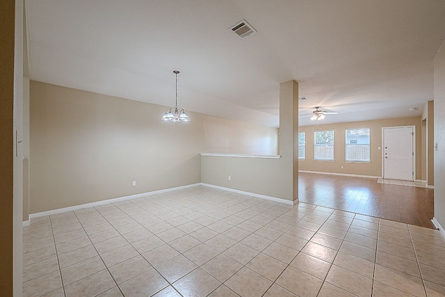 7725 Buckmeadow Dr, Georgetown, TX 78628 - spare room with light tile patterned flooring, a ceiling fan, and baseboards