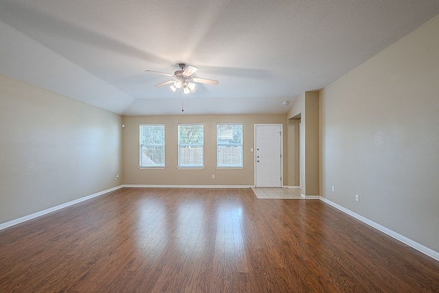 7725 Buckmeadow Dr, Georgetown, TX 78628 - empty room with ceiling fan, wood finished floors, and baseboards