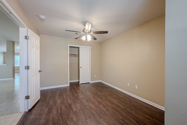 7725 Buckmeadow Dr, Georgetown, TX 78628 - unfurnished bedroom featuring a closet, wood finished floors, and a ceiling fan
