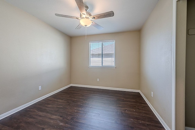 7725 Buckmeadow Dr, Georgetown, TX 78628 - empty room featuring baseboards, wood finished floors, and a ceiling fan