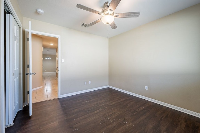 7725 Buckmeadow Dr, Georgetown, TX 78628 - empty room featuring ceiling fan, wood finished floors, a smoke detector, and baseboards