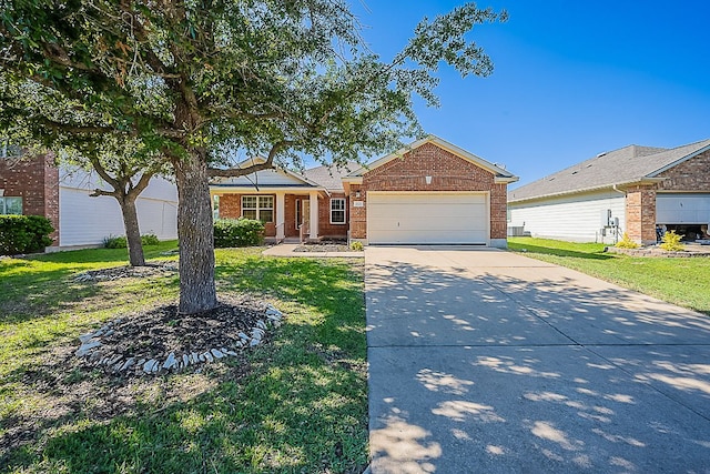7725 Buckmeadow Dr, Georgetown, TX 78628 - ranch-style home with brick siding, driveway, an attached garage, and a front yard