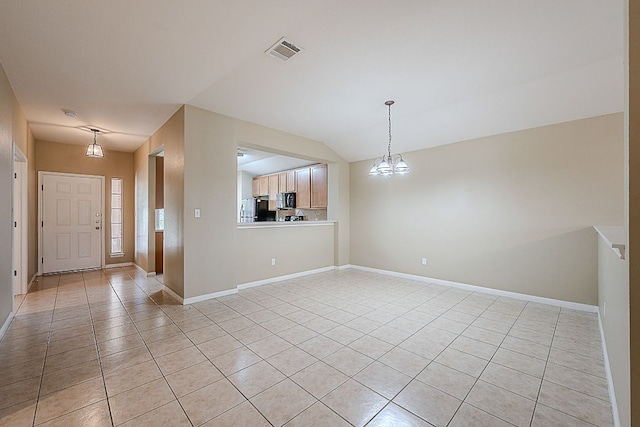 7725 Buckmeadow Dr, Georgetown, TX 78628 - entrance foyer with baseboards, a notable chandelier, visible vents, and light tile patterned flooring
