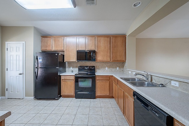 7725 Buckmeadow Dr, Georgetown, TX 78628 - kitchen with a sink, visible vents, black appliances, light countertops, and tasteful backsplash