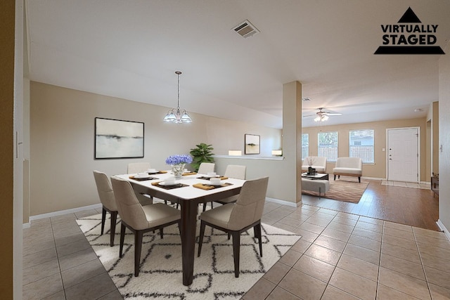 7725 Buckmeadow Dr, Georgetown, TX 78628 - dining area with light tile patterned floors, baseboards, and a ceiling fan