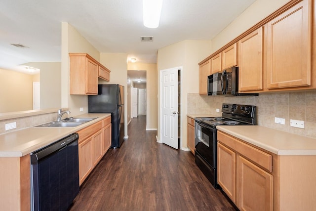 13605 James Garfield St, Manor, TX 78653 - kitchen with a sink, light brown cabinetry, visible vents, dark wood-style flooring, and black appliances