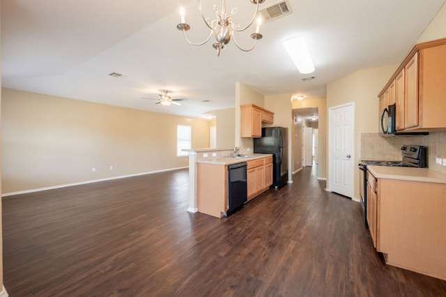 13605 James Garfield St, Manor, TX 78653 - kitchen with ceiling fan with notable chandelier, a sink, dark wood finished floors, visible vents, and black appliances
