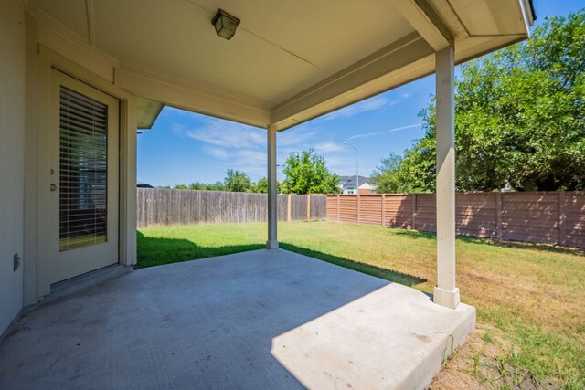 13605 James Garfield St, Manor, TX 78653 - view of patio / terrace with a fenced backyard