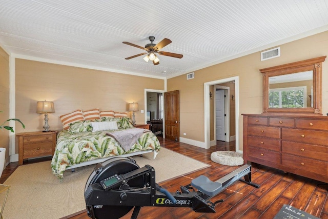 1200 County Road 211, Giddings, TX 78942 - bedroom with baseboards, ceiling fan, wood-type flooring, and visible vents