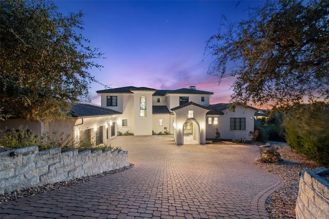 5609 Laceback Ter, Austin, TX 78738 - mediterranean / spanish home featuring stucco siding and decorative driveway