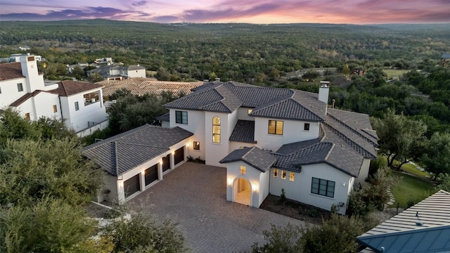 5609 Laceback Ter, Austin, TX 78738 - view of subject property with a heavily wooded area