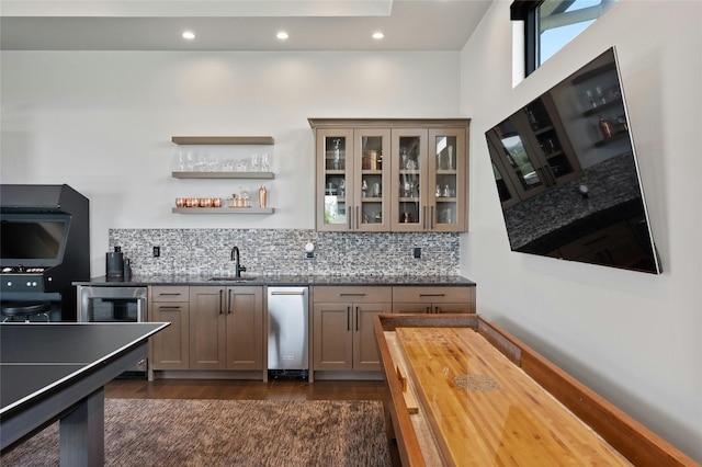 5609 Laceback Ter, Austin, TX 78738 - indoor wet bar with backsplash, dark wood-style floors, recessed lighting, and wine cooler
