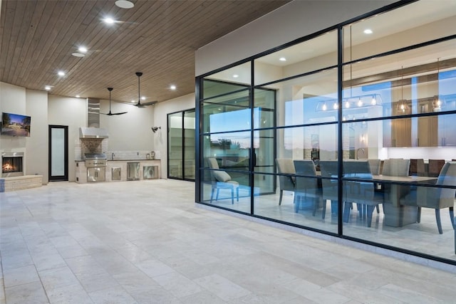 5609 Laceback Ter, Austin, TX 78738 - view of patio featuring exterior kitchen and ceiling fan
