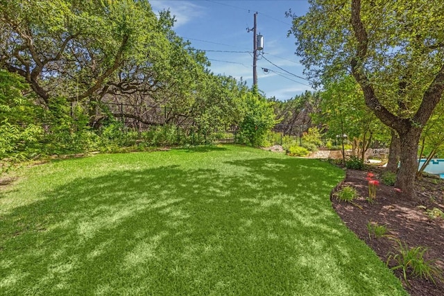view of yard featuring fence