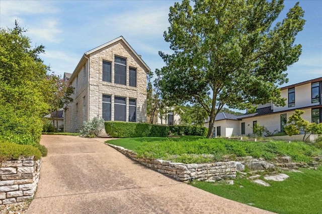 exterior space featuring stone siding