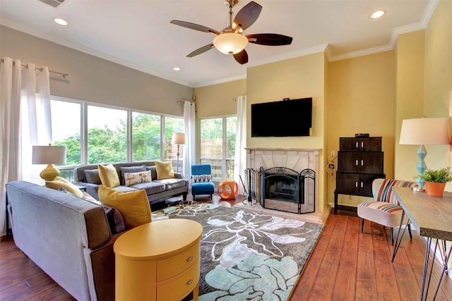 2208 Trailside Dr, Austin, TX 78704 - living room with recessed lighting, wood-type flooring, a ceiling fan, and a tile fireplace