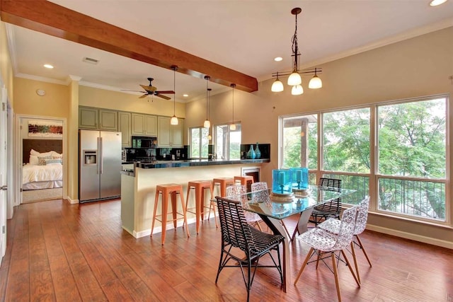 2208 Trailside Dr, Austin, TX 78704 - dining area with crown molding, visible vents, wood finished floors, and recessed lighting