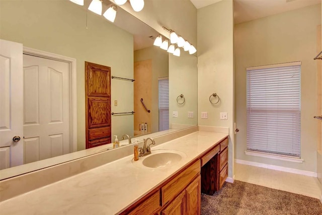2208 Trailside Dr, Austin, TX 78704 - bathroom with baseboards and vanity