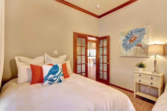 2208 Trailside Dr, Austin, TX 78704 - bedroom with french doors, baseboards, ornamental molding, and carpet floors