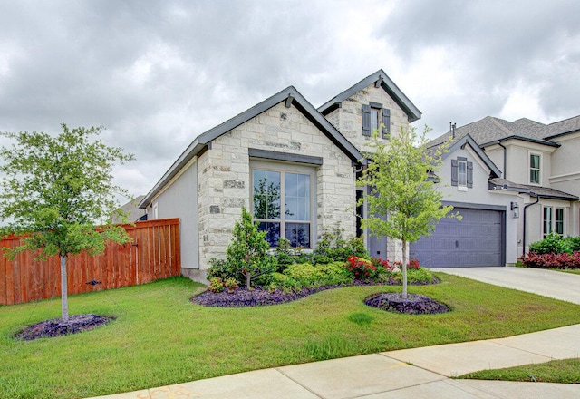 6320 Lipan Bayou Trl, Austin, TX 78738 - view of front facade featuring stone siding, driveway, and a garage