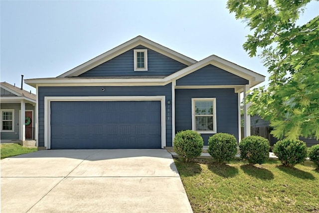 7013 Tonka Ln, Austin, TX 78744 - single story home featuring driveway, an attached garage, and a front yard