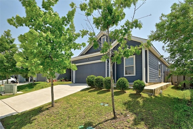 7013 Tonka Ln, Austin, TX 78744 - view of front of home featuring concrete driveway and an attached garage