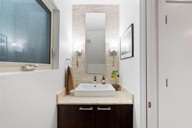 310 Terrace Dr Unit B, Austin, TX 78704 - bathroom featuring backsplash and vanity