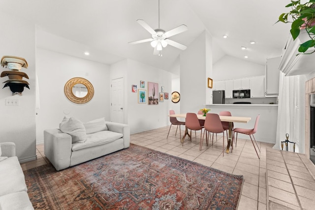 649 Aspen Ln, Cottonwood Shores, TX 78657 - living area with light tile patterned floors, a ceiling fan, recessed lighting, high vaulted ceiling, and baseboards