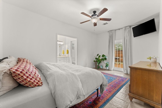 649 Aspen Ln, Cottonwood Shores, TX 78657 - bedroom featuring connected bathroom and a ceiling fan