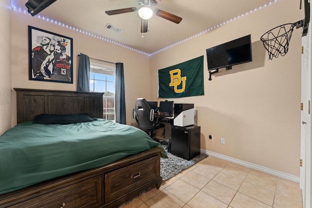 649 Aspen Ln, Cottonwood Shores, TX 78657 - bedroom with light tile patterned flooring and baseboards