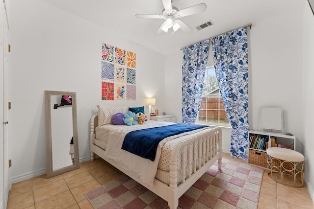 649 Aspen Ln, Cottonwood Shores, TX 78657 - bedroom featuring light tile patterned floors, a ceiling fan, and baseboards