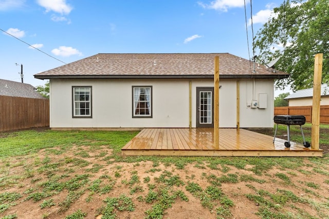 649 Aspen Ln, Cottonwood Shores, TX 78657 - back of house featuring a deck and roof with shingles