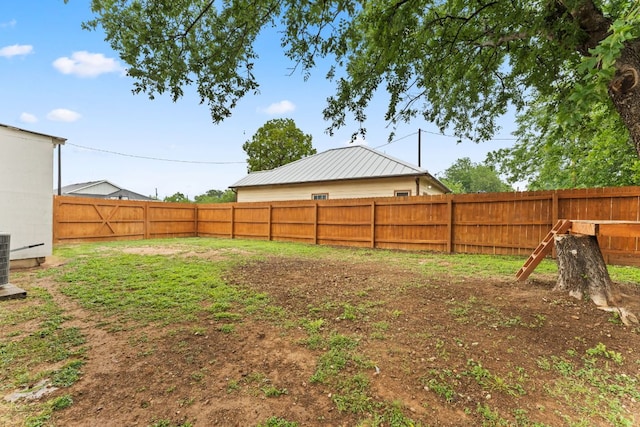 649 Aspen Ln, Cottonwood Shores, TX 78657 - fenced backyard featuring central AC