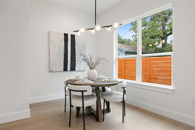 1702 Pennsylvania Ave, Austin, TX 78702 - dining room featuring wood finished floors and baseboards