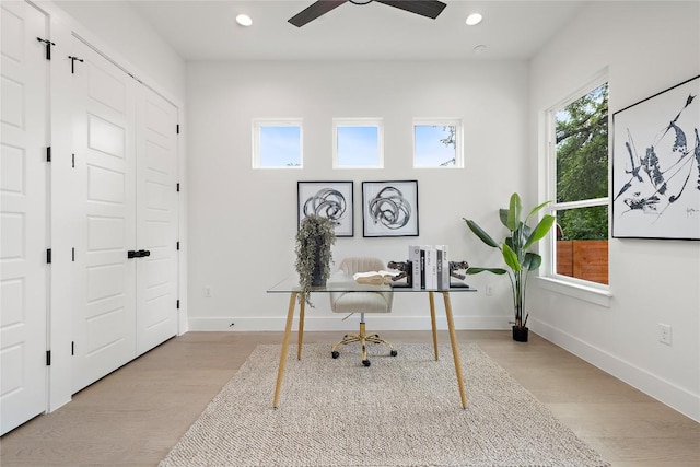 1702 Pennsylvania Ave, Austin, TX 78702 - home office featuring recessed lighting, wood finished floors, baseboards, and ceiling fan