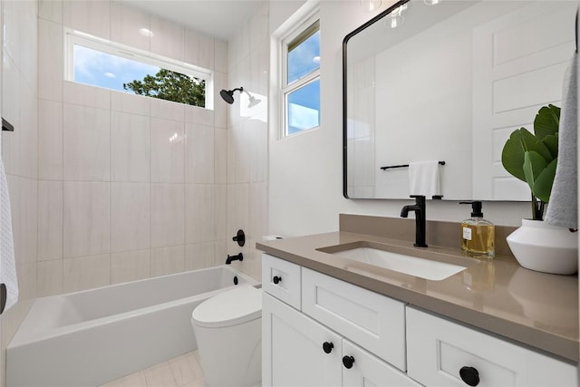 1702 Pennsylvania Ave, Austin, TX 78702 - bathroom with plenty of natural light, vanity, shower / washtub combination, and toilet