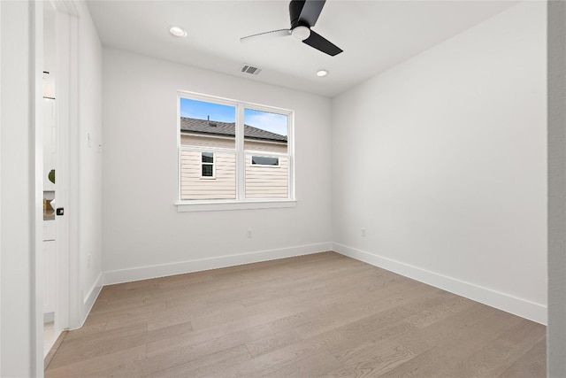1702 Pennsylvania Ave, Austin, TX 78702 - spare room with light wood-type flooring, ceiling fan, baseboards, and recessed lighting