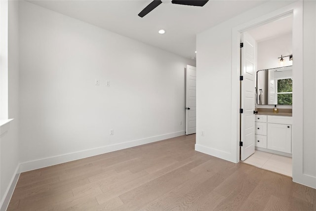1702 Pennsylvania Ave, Austin, TX 78702 - unfurnished bedroom featuring light wood-style floors, recessed lighting, baseboards, ensuite bath, and ceiling fan