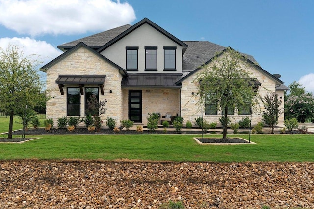 209 Northcrest Dr, Liberty Hill, TX 78642 - view of front of property with a standing seam roof, a shingled roof, a front yard, and stone siding