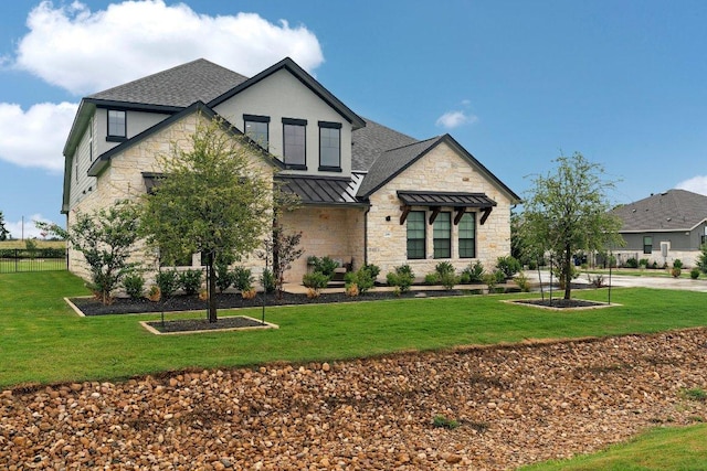 209 Northcrest Dr, Liberty Hill, TX 78642 - view of front facade with a standing seam roof, stone siding, and roof with shingles