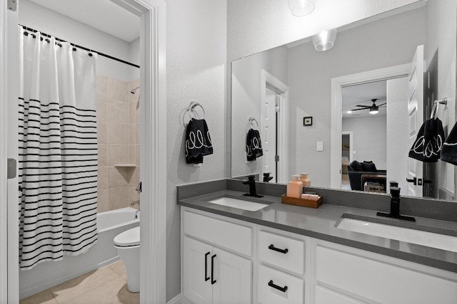 209 Northcrest Dr, Liberty Hill, TX 78642 - bathroom featuring shower / tub combo, ceiling fan, double vanity, toilet, and tile patterned flooring