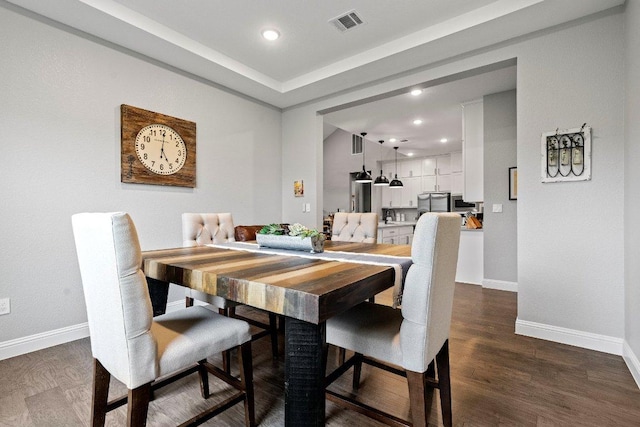 209 Northcrest Dr, Liberty Hill, TX 78642 - dining area with baseboards, dark wood finished floors, and recessed lighting