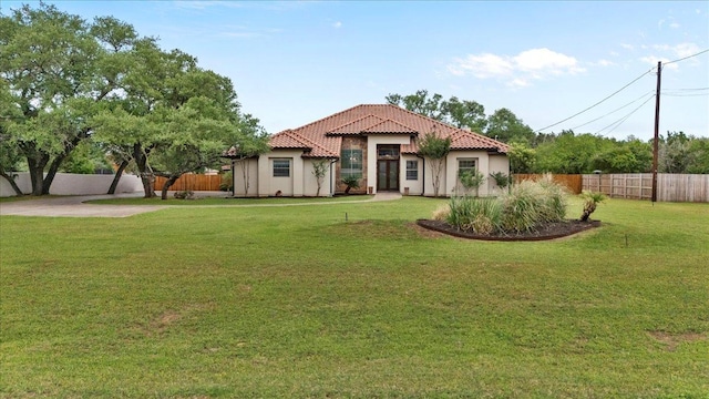 view of front of home featuring a tile roof and stucco siding