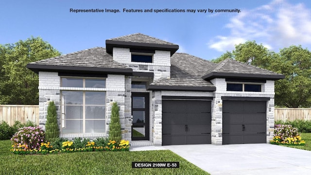 121 Spring Bluff Ln, Georgetown, TX 78628 - view of front of property featuring a garage, driveway, and stone siding